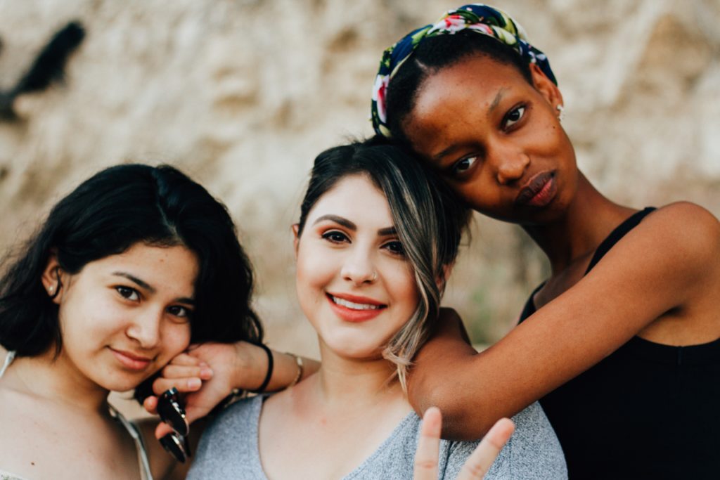 3 Diverse women standing together