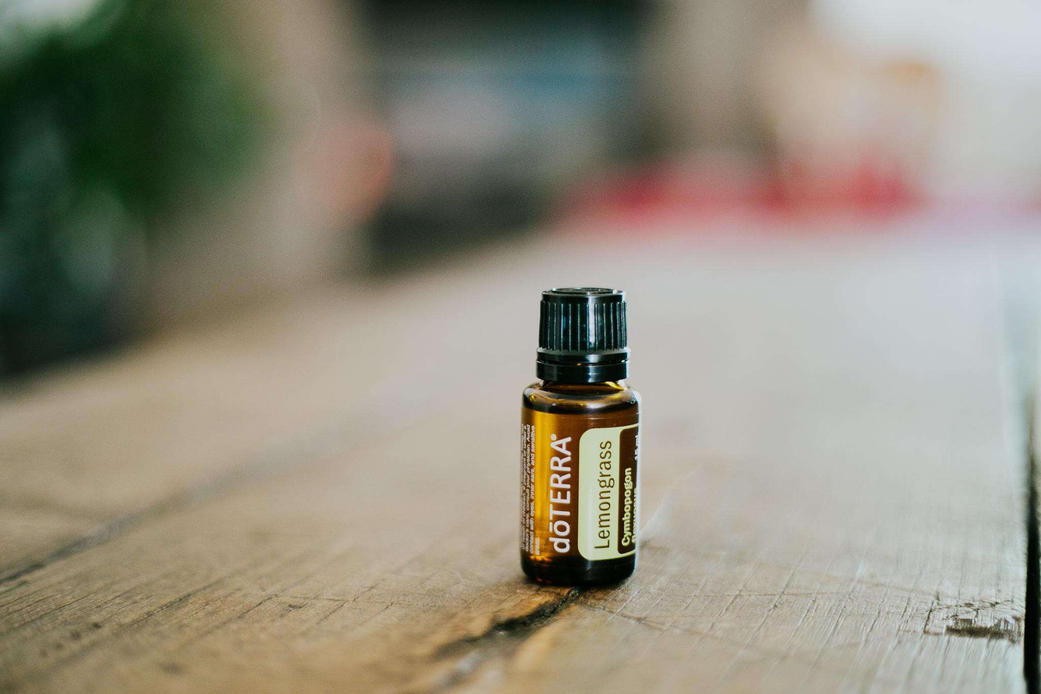 Lemongrass Essential oil bottle on wooden table