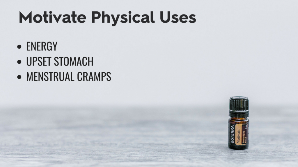 Motivate Essential oil bottle on wood table with physical uses listed as: energy, upset stomach and menstral cramps, 