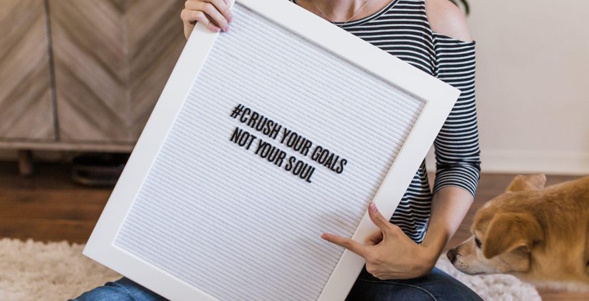 Letterboard that read "Crush your goals not your soul"