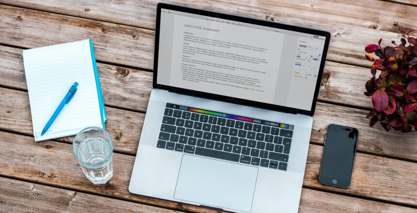 A computer with water showing productivity (self-care)