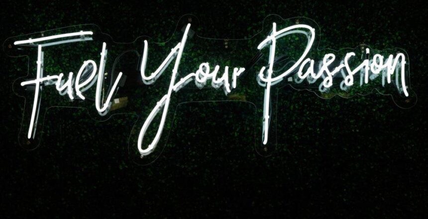 Fuel Your Passion in handwriting-esque neon lights